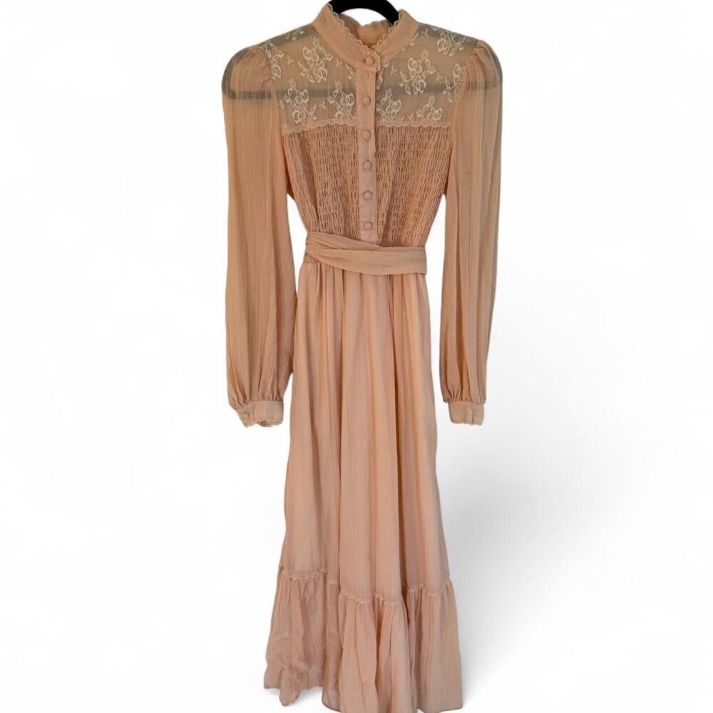 Beautiful vintage 70s maxi dress with lace detailing and tie waist